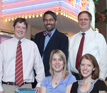 In 2009, four of our physicians-in-training received national recognition for their scholarly work. Standing, from left: Allergy & Immunology fellow Dan Jackson, MD; resident Dipesh Navsaria, MD, MPH, and Vice Chair for Education John Frohna, MD, MPH. Seated, from left: Endocrinology & Diabetes fellow Lindsey Nicol, MD, and resident Katherine Baker, MD.